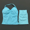 A light blue women's seamless fitness set consisting of a cropped top and matching bottoms.