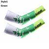 A pair of green sports arm sleeves with white tree designs shown against a white background.