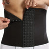 A black slimming corset waist trainer belt being worn on a person's torso.