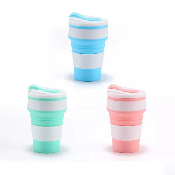 Reusable silicone collapsible coffee cups with lids in white, blue, and pink colors.