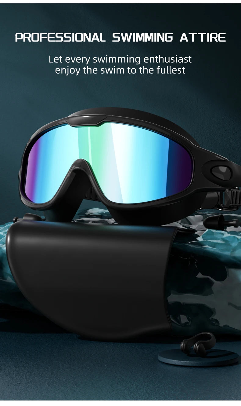 A pair of black swimming goggles with blue-tinted lenses resting on a teal fabric.