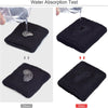 Demonstration of water absorption test for a black sweat-absorbing sports wrist guard product.