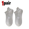 A pair of light gray breathable men's running socks shown from the top view.