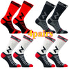 Four pairs of black and red compression cycling socks shown from various angles.