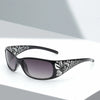 Gafas negras con montura cuadrada y patrón floral Y2K.