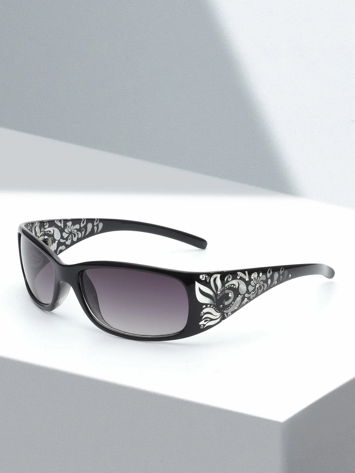Gafas negras con montura cuadrada y patrón floral Y2K.