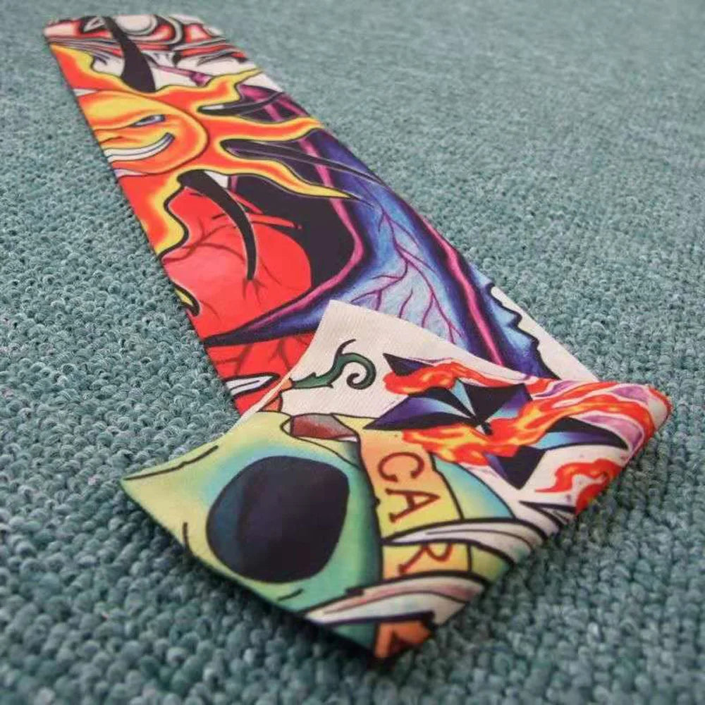 A colorful, abstract design featuring flames and vibrant colors on a long seamless tattoo sleeve.