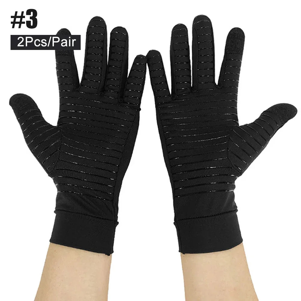 Pair of black copper compression fingerless gloves worn on a hand.