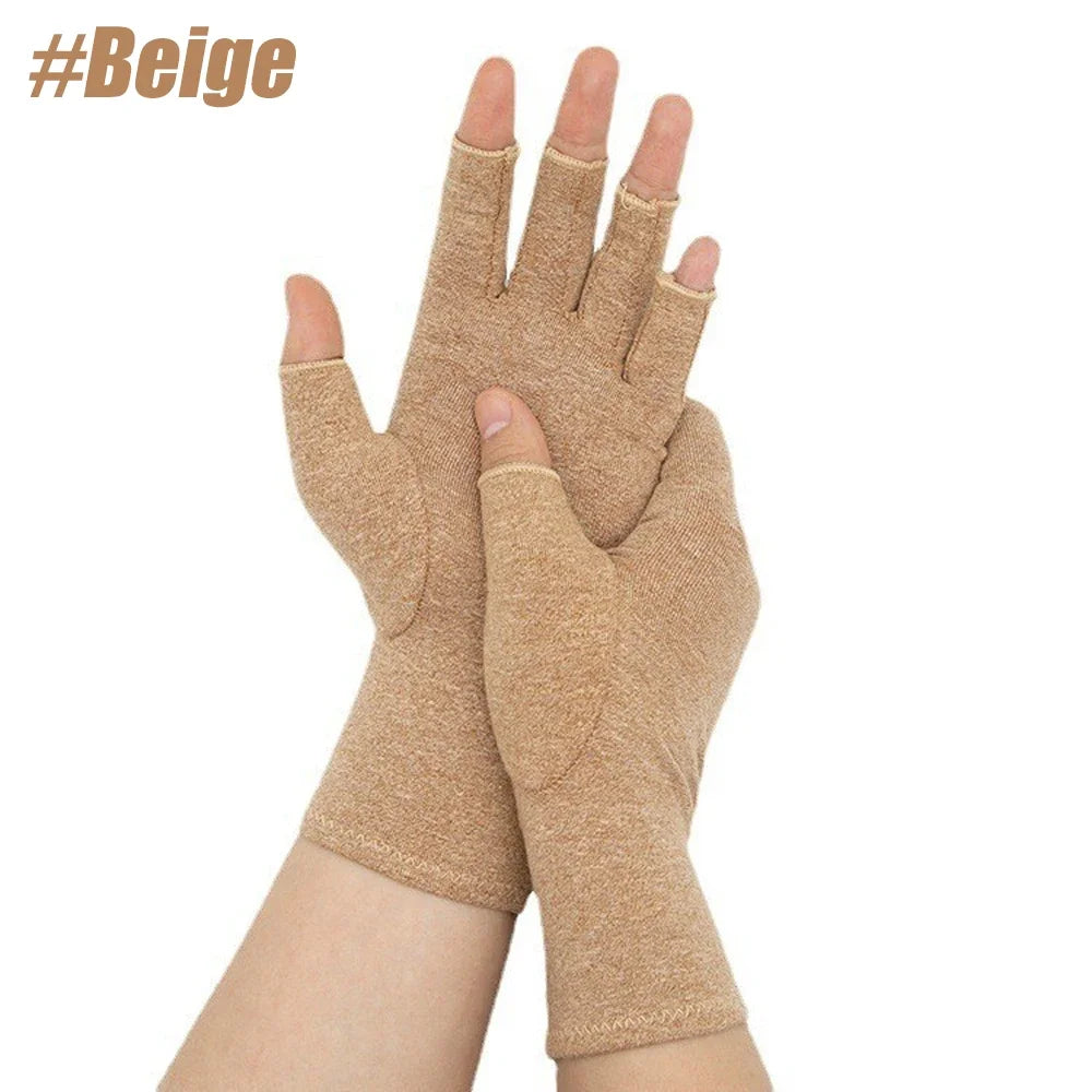 Tan compression hand gloves worn on a hand and wrist.