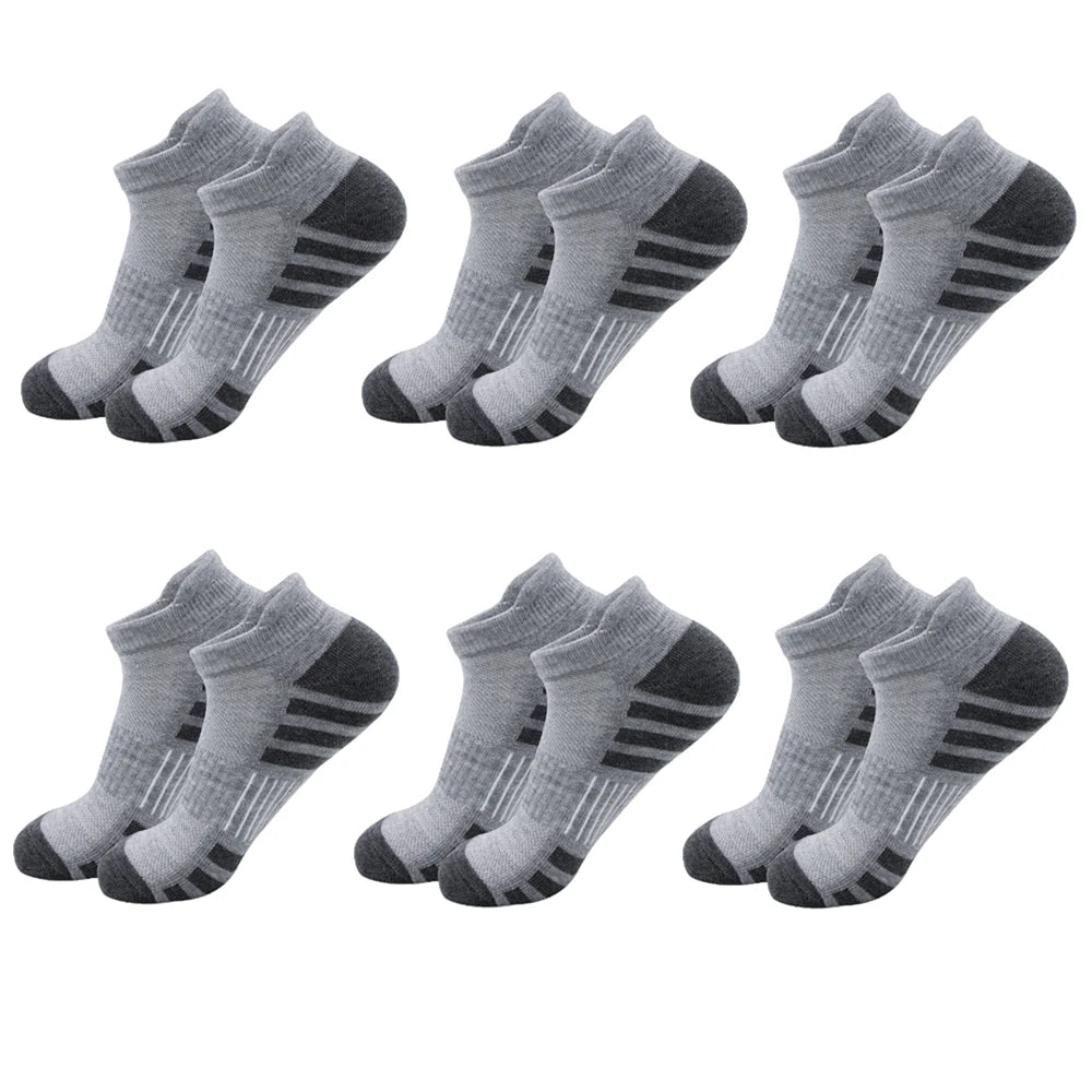 A set of athletic running socks for men and women in gray and black stripes.