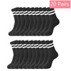 20 paires de chaussettes en tricot noir mi-mollet pour femmes, respirantes, empilées.