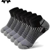 A set of six pairs of black athletic knit ankle socks displayed in a row.