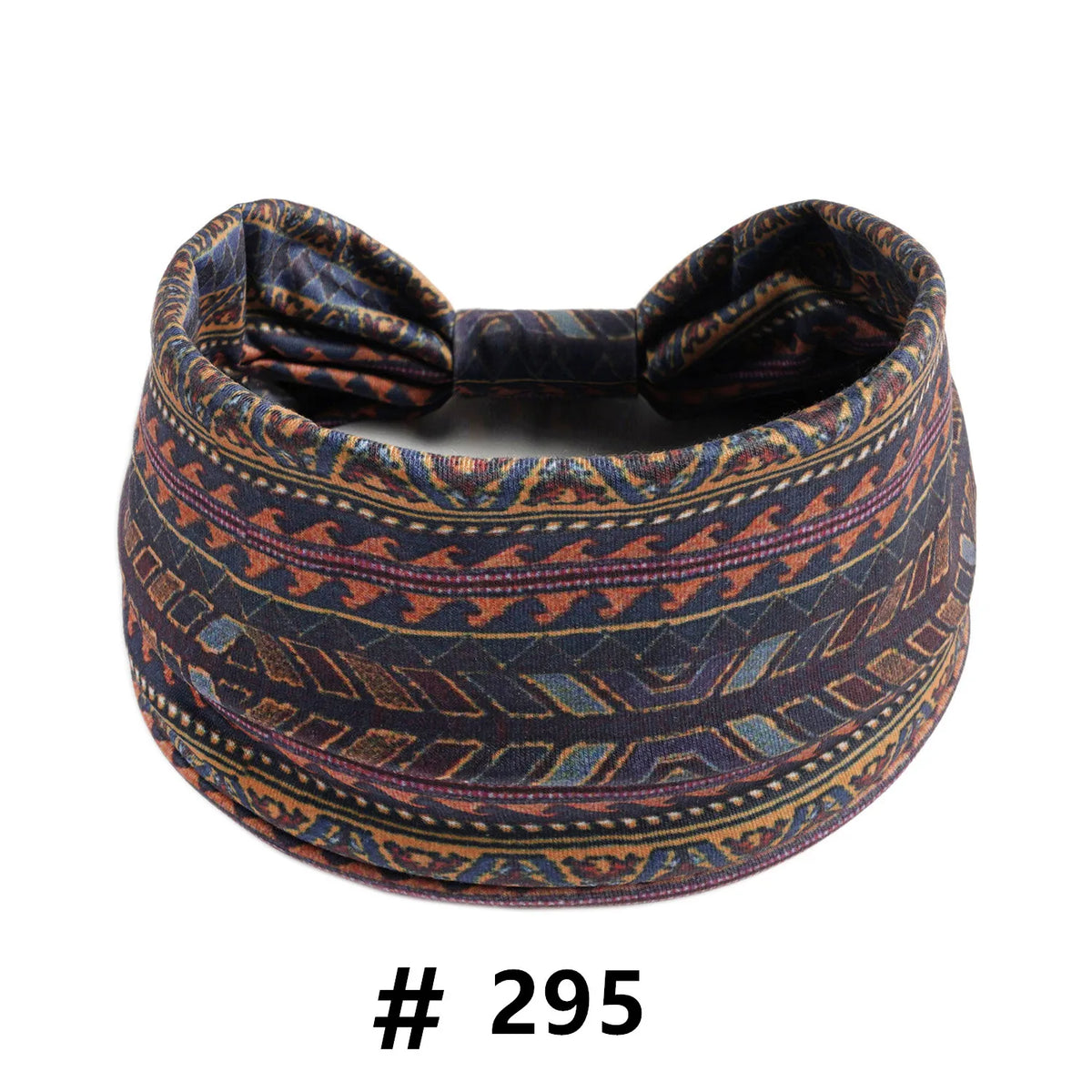 A dark patterned boho cotton turban headband with a bow, suitable for workout or yoga.