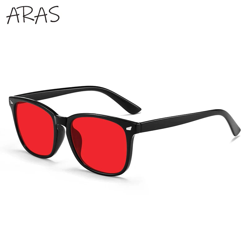 A pair of black sunglasses with bright red lenses shown against a white background.