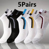 Five pairs of men's color-block mesh ankle socks displayed in various colors and shades.