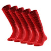 A row of red knee-high sports socks laid out, showing the texture and fit.