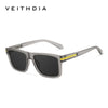 Gray-framed square sunglasses with dark lenses and yellow accents