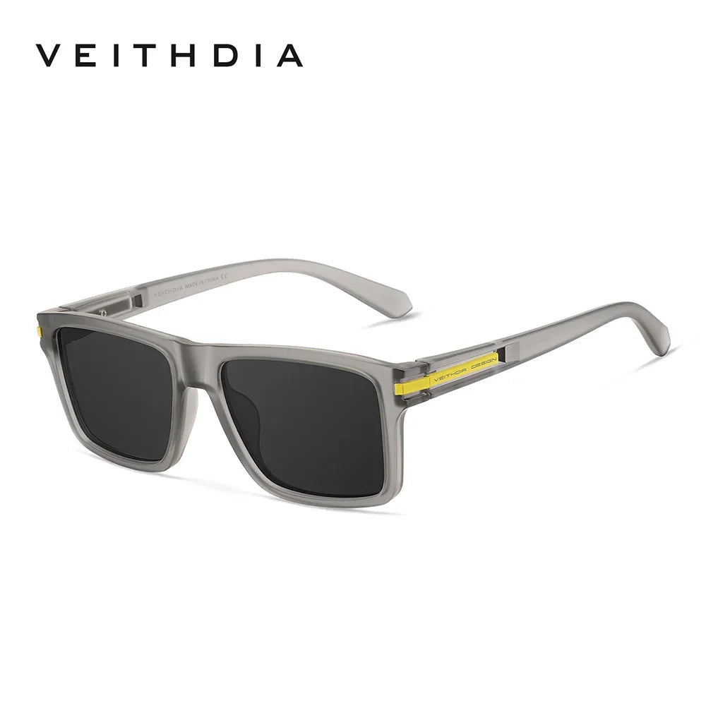 Gray-framed square sunglasses with dark lenses and yellow accents
