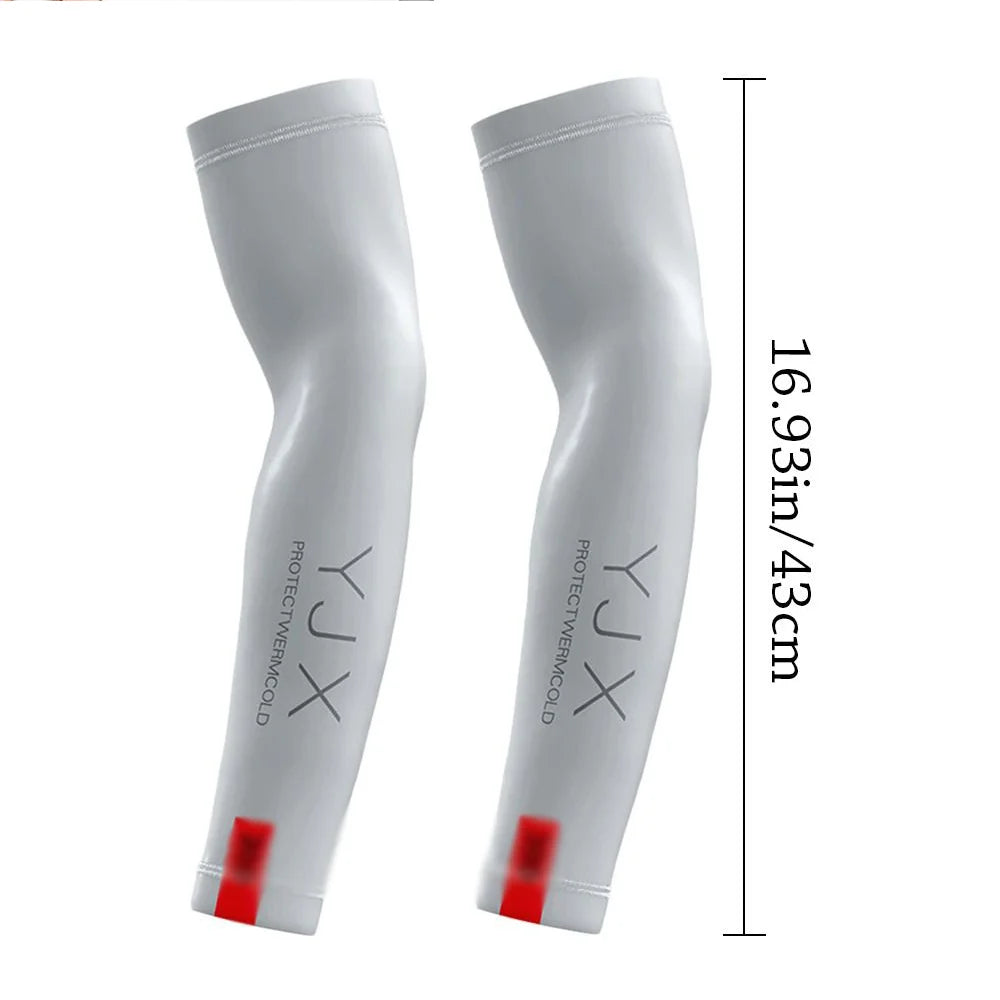 A pair of white protective arm sleeves shown vertically with a measurement of 16.93 inches or 43 cm.