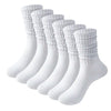 A stack of six pairs of white slouch knit scrunch socks displayed on a white background.