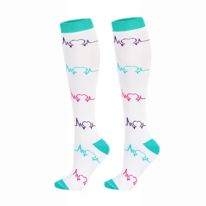 White compression elastic socks with pink heart patterns and teal cuffs