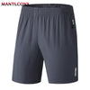 Dark gray men's quick dry jogging shorts shown flat lay