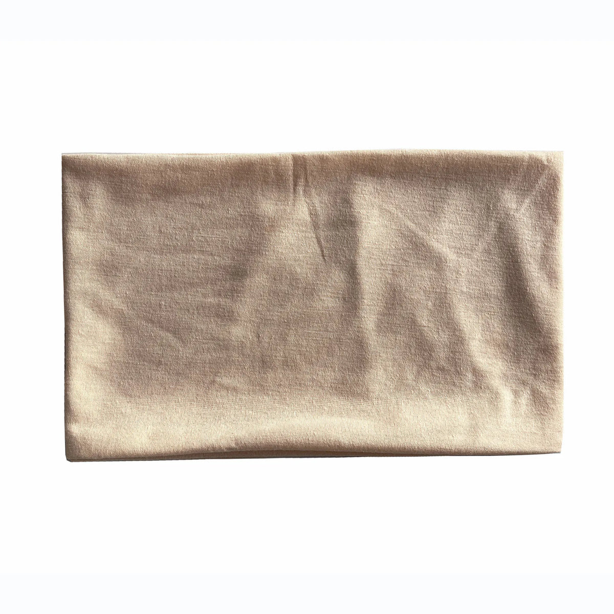 A beige fabric headband for hair or sports.