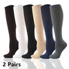 Two pairs of high-compression knee-high stockings in various solid colors including black white beige and navy
