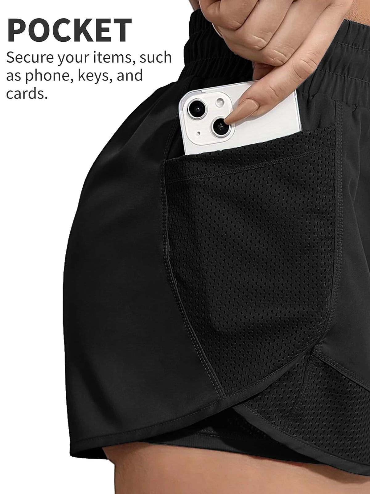 A close-up of a black athletic short featuring a secure pocket used to hold a smartphone.