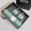A light green 500ml stainless steel vacuum flask set displayed in a black box.