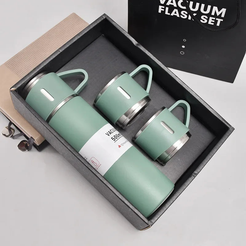 A light green 500ml stainless steel vacuum flask set displayed in a black box.