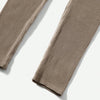 A pair of beige seamless high-waisted yoga leggings shown flat lay.