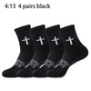 Four pairs of black prayer and cross grip sports socks are displayed.