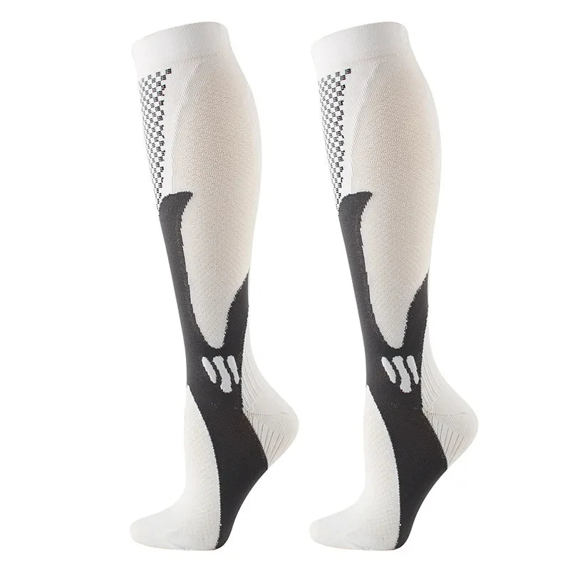 A pair of white compression socks with black patterned designs for circulation and recovery.