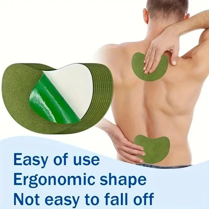 A hand is applying a green ergonomic heat patch to the back of a person's neck and shoulder area.