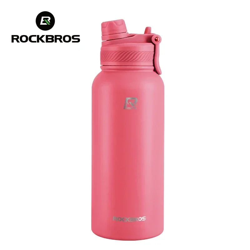 A pink insulated stainless steel thermal water bottle with a screw-on cap.