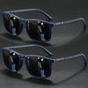 A pair of dark blue vintage square sunglasses with black lenses and a textured frame are displayed on a dark surface.