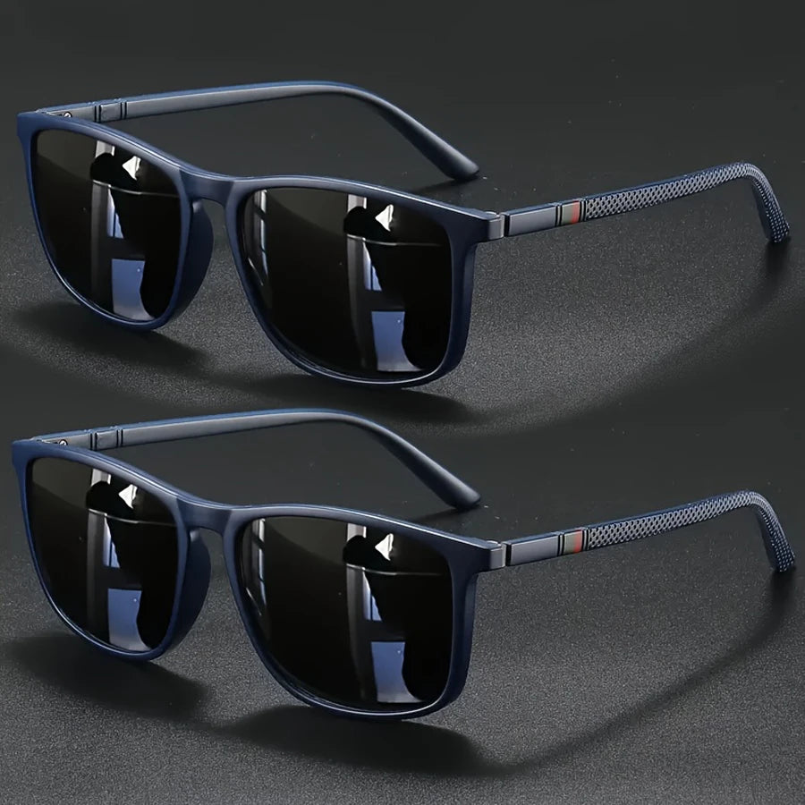 A pair of dark blue vintage square sunglasses with black lenses and a textured frame are displayed on a dark surface.