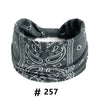 A dark gray boho print cotton headband worn around the head.