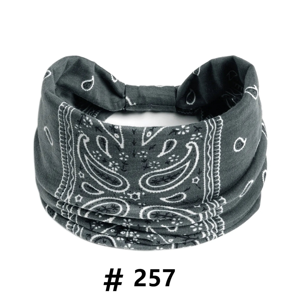 A dark gray boho print cotton headband worn around the head.