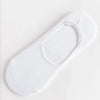 Chaussettes blanches en silicone invisibles et respirantes pour hommes, vues à plat