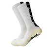 Ein Paar weiße Sportsocken mit schwarzen Streifen und gelbem Sohlen