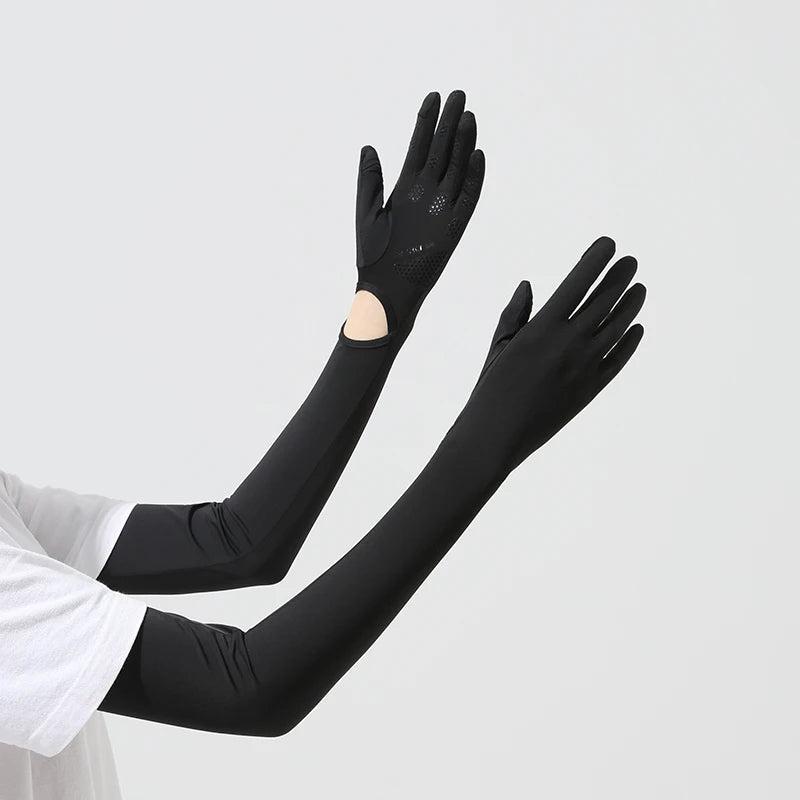 Black UPF 50+ sun protection arm sleeves worn on an arm.