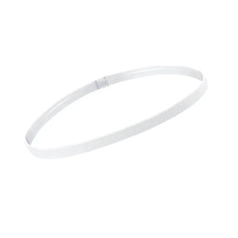 A white elastic sports headband is shown lying flat.