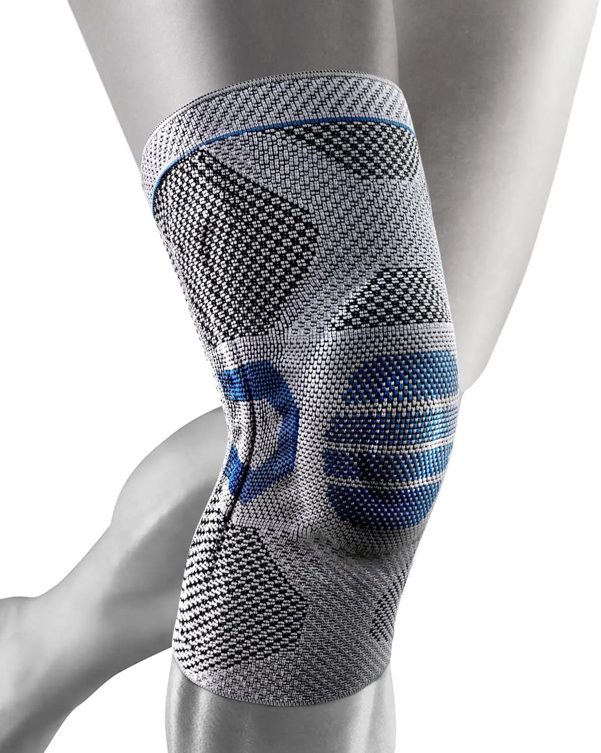 A close-up of a gray knee brace with blue accents, worn on a person's leg.