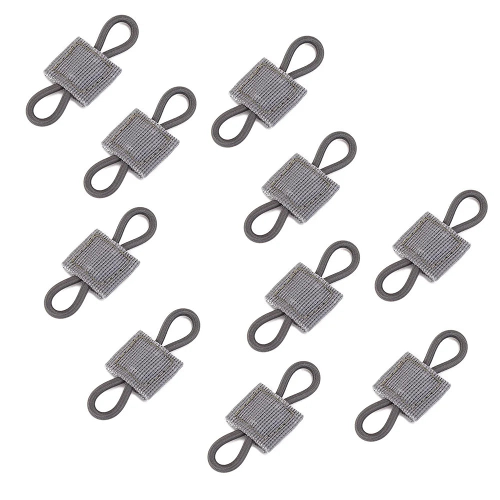 A multi-pack of gray tactical antenna binding buckles.