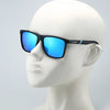 A pair of black sunglasses with blue polarized lenses displayed on a white mannequin head.