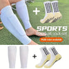 A set of white and yellow sports football socks and knee guards shown on a person's leg.