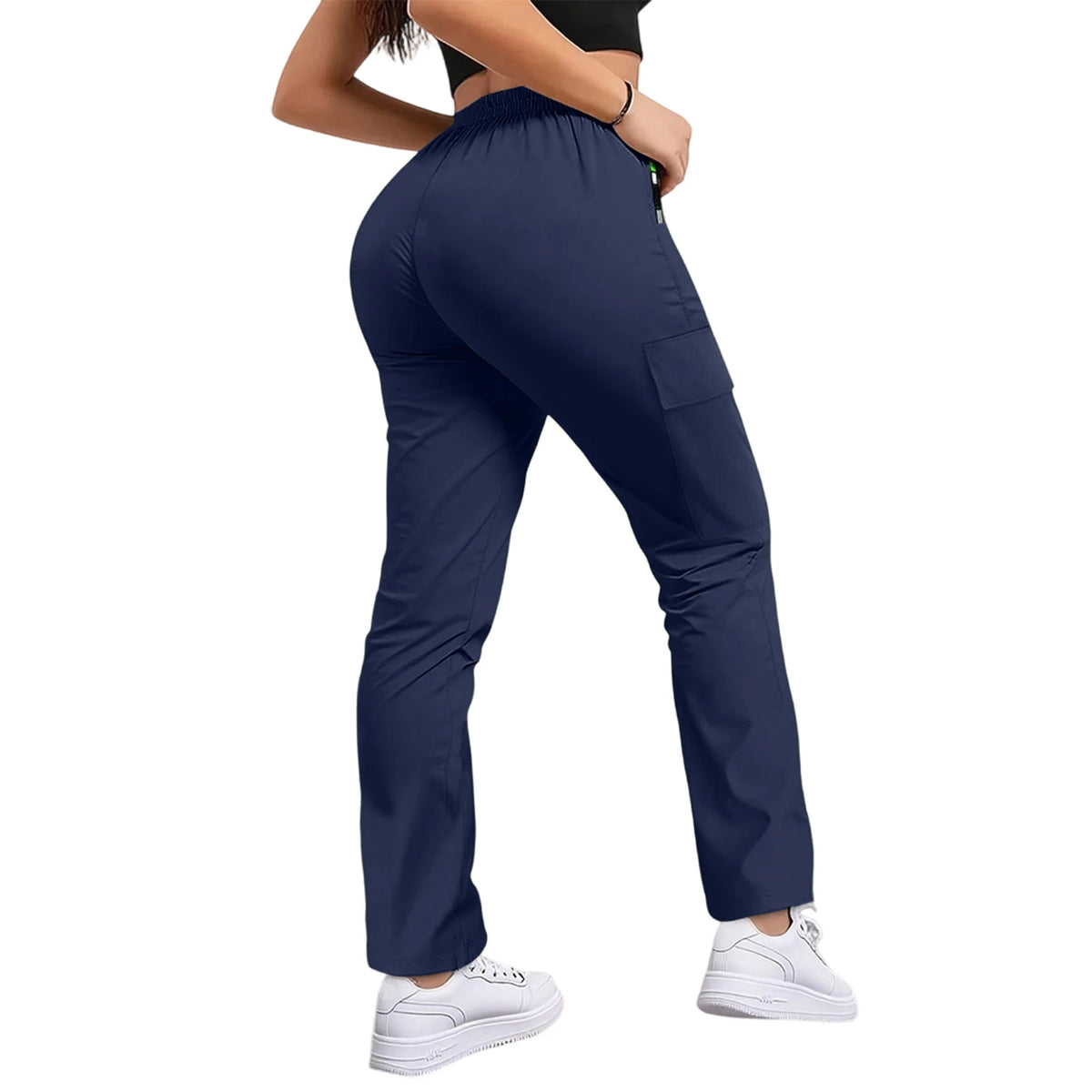 A woman wearing navy blue straight fit drawstring cargo pants and a black top.