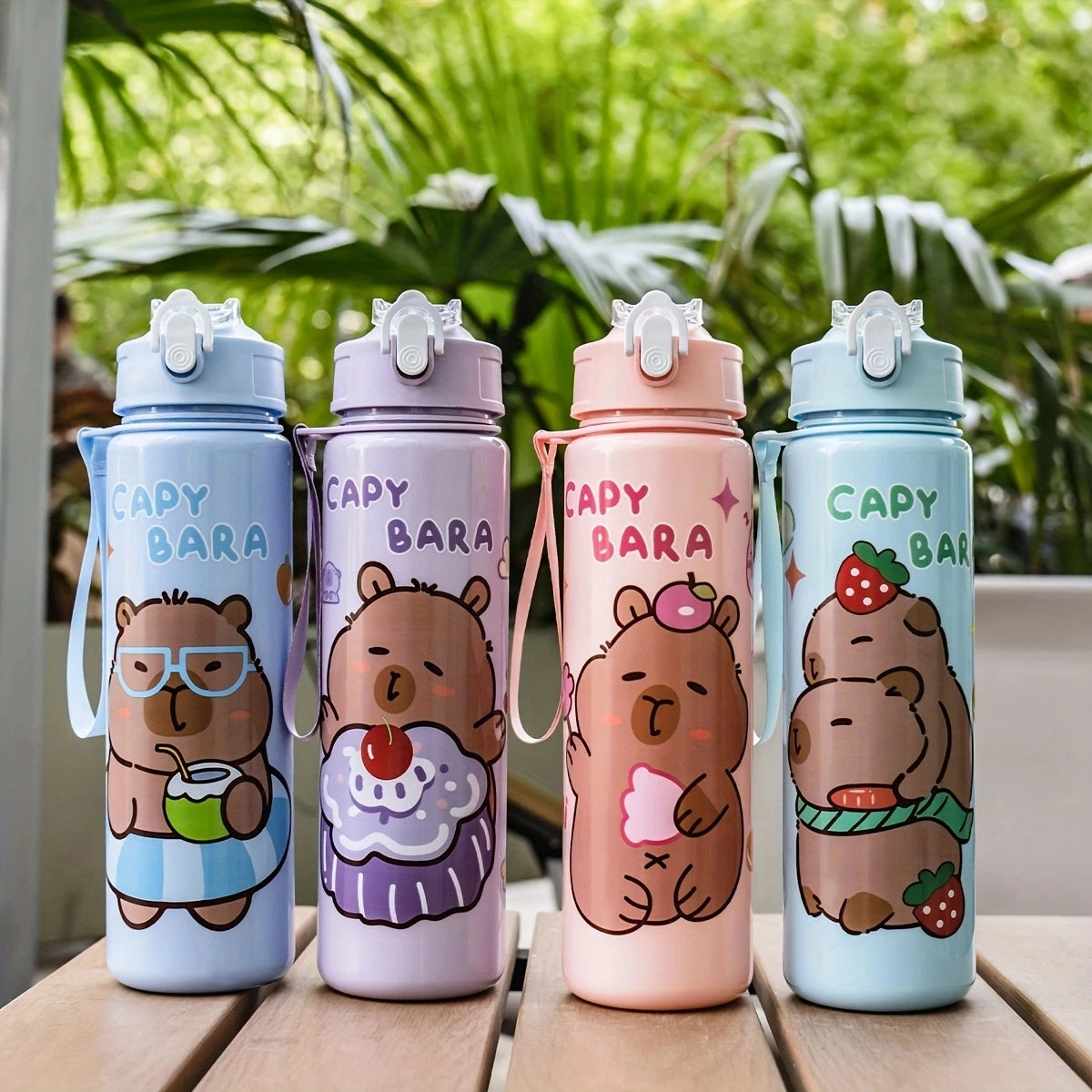 A set of four cartoon drinking water bottles featuring cute bear characters in various pastel colors.